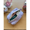 La trousse de toilette Damier